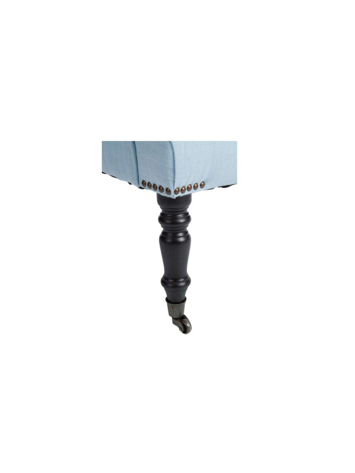 Fauteuil capitonné bleu ciel