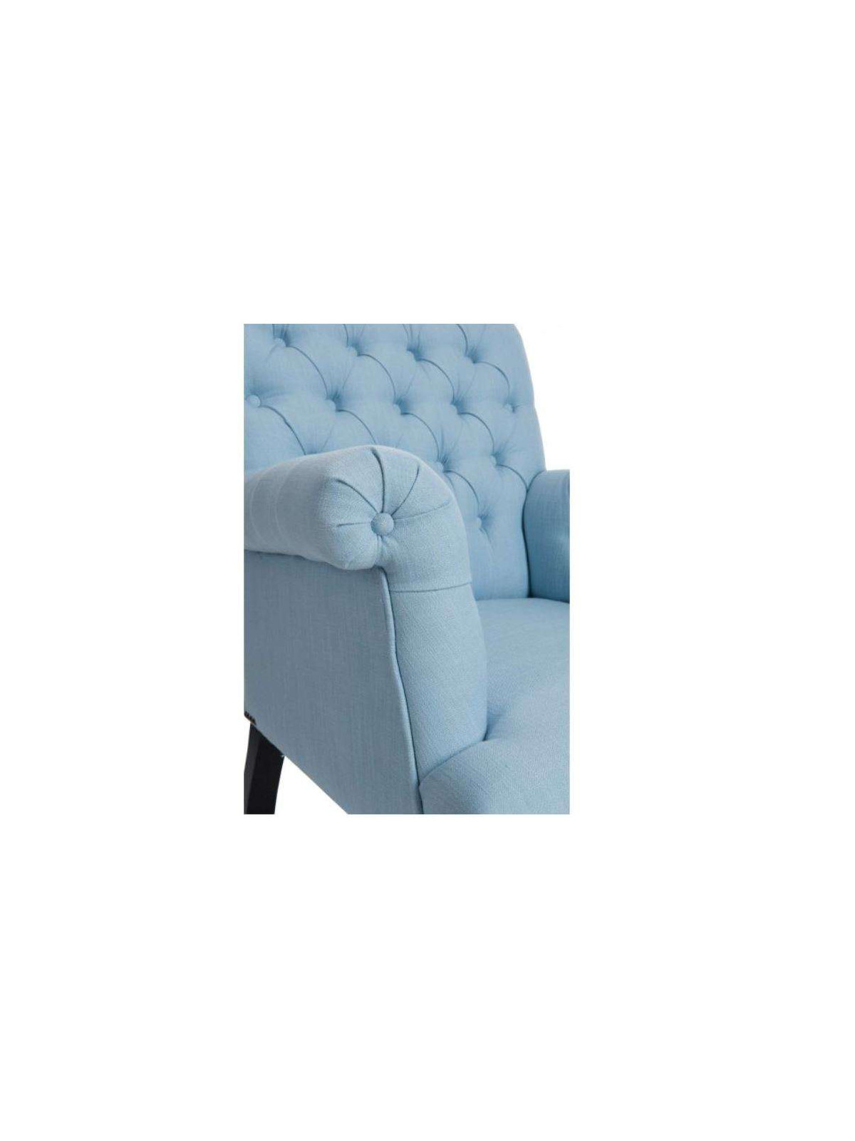 Fauteuil capitonné bleu ciel