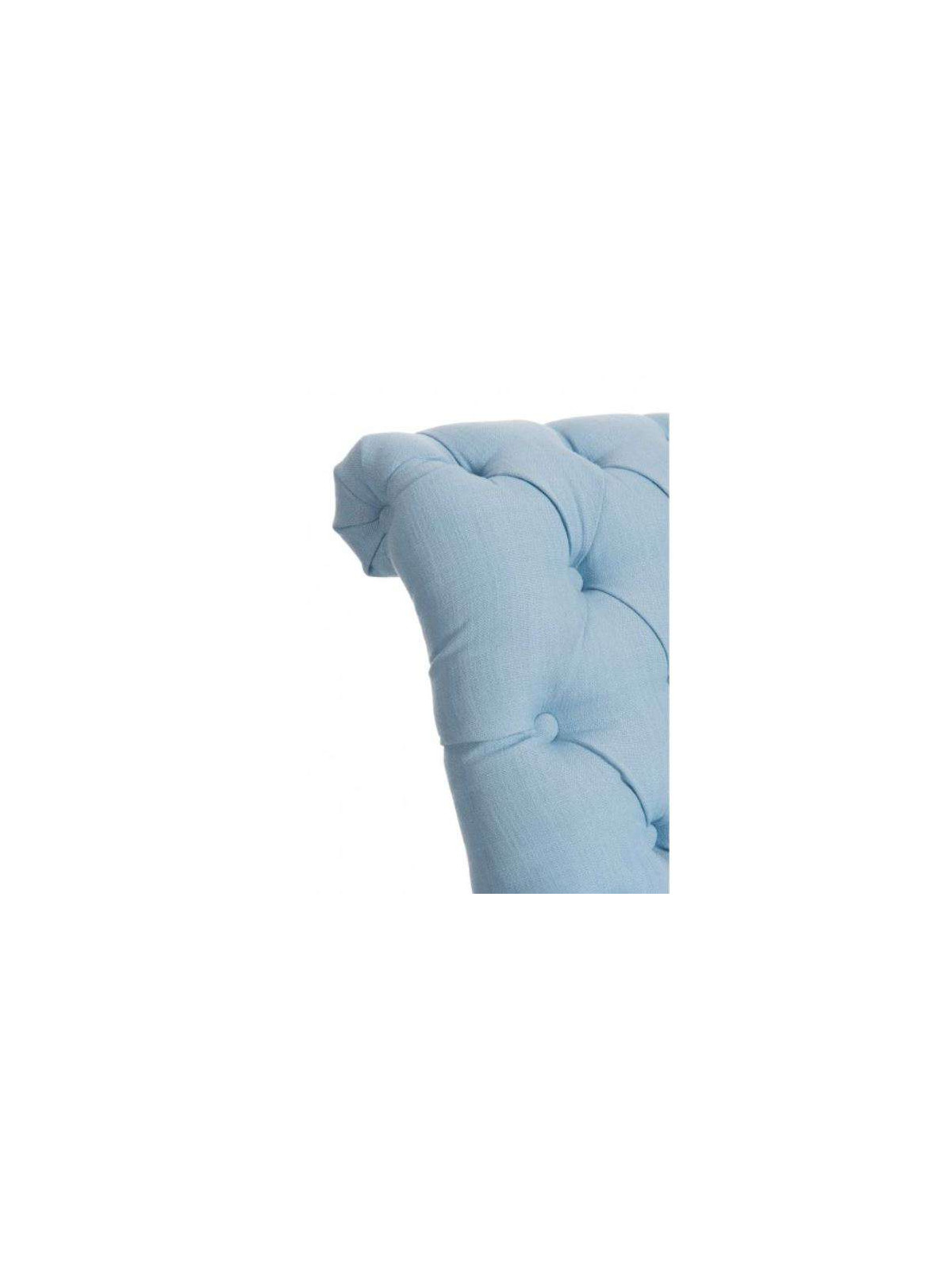 Fauteuil capitonné bleu ciel