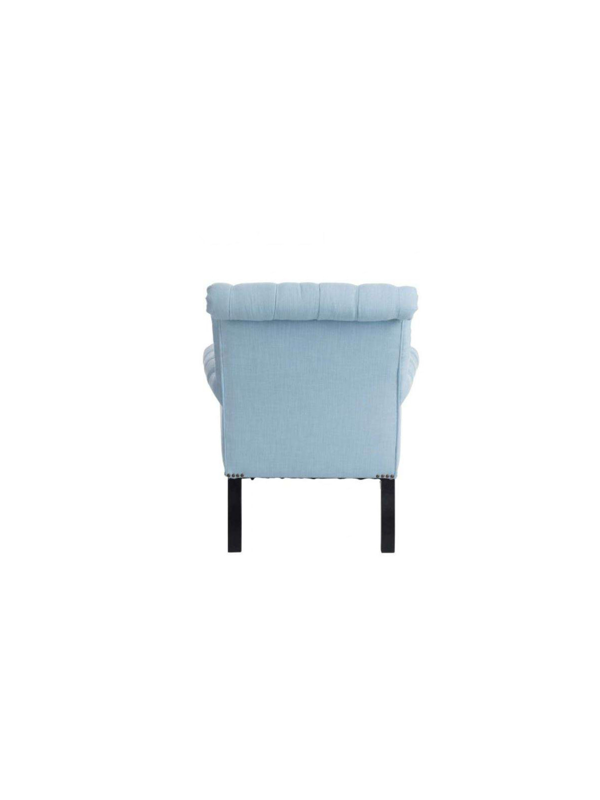 Fauteuil capitonné bleu ciel