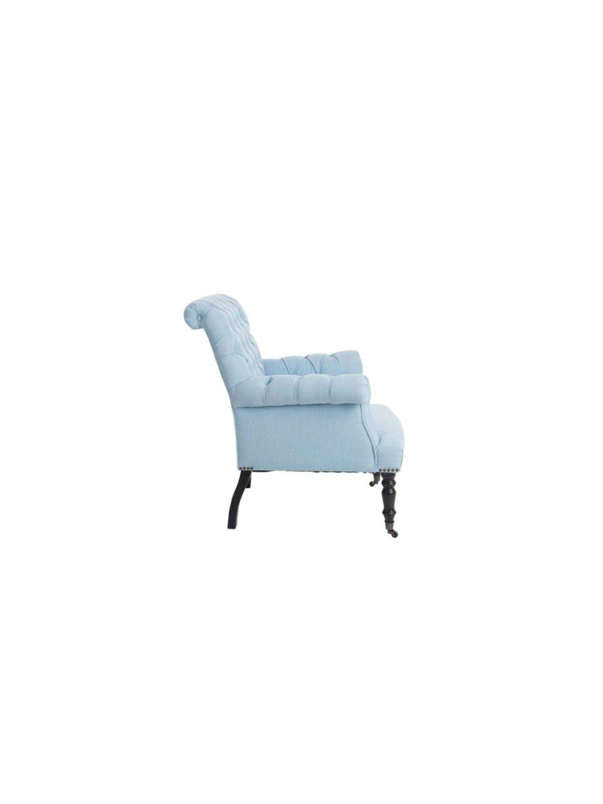Fauteuil capitonné bleu ciel