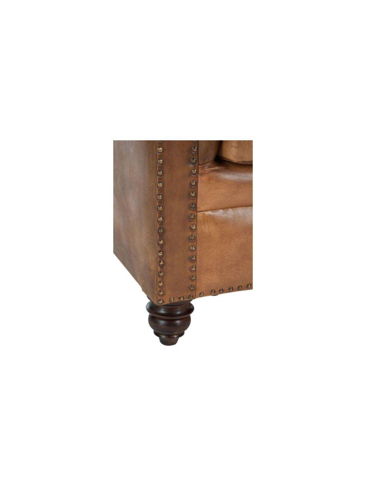 Fauteuil Chesterfield cuir capitonné