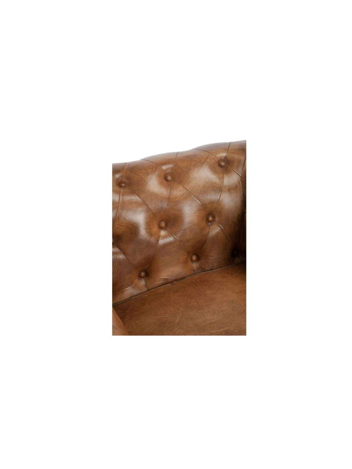 Fauteuil Chesterfield cuir capitonné