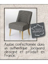 Fauteuil bas motifs noir et gris clair