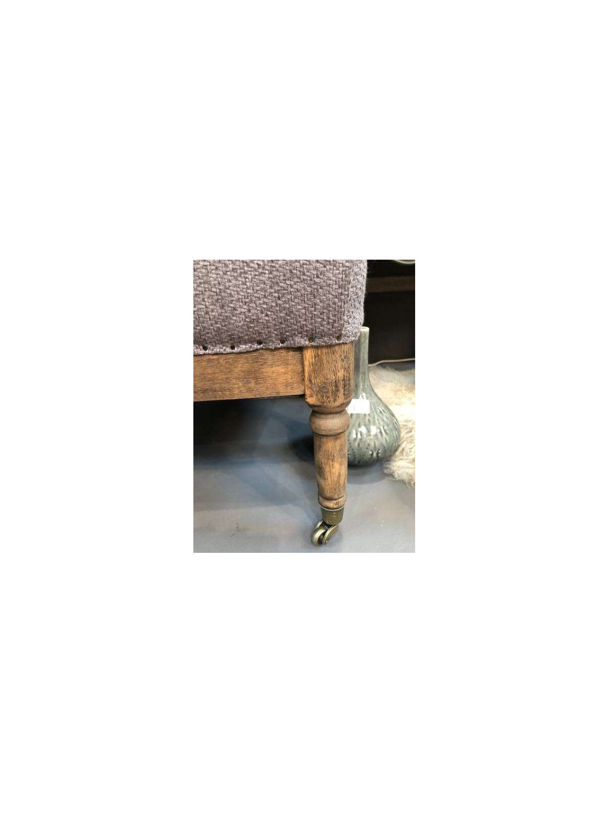 Fauteuil gris chiné sur rouletttes