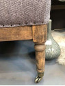 Fauteuil gris chiné sur rouletttes Fauteuil gris chiné sur rouletttes